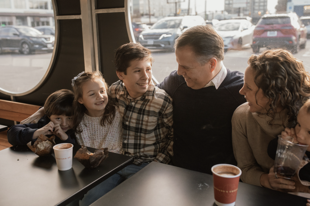 Family of six hangs out in Blanchards Coffee in Richmond, VA. 