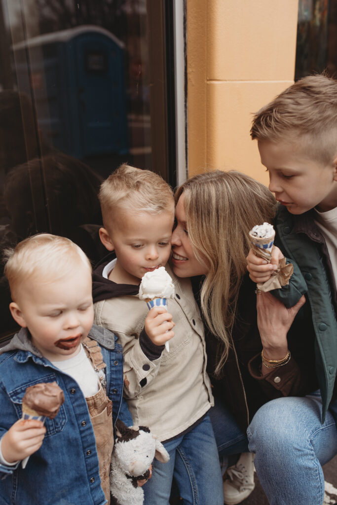 Candid family photo of mom with her boys